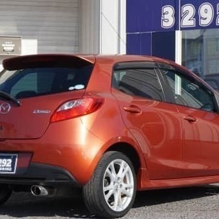 シックなオレンジ色のデミオスポルト。どんな方でも車がローンで買える！実績のある自社ローンの最大手はコチラ！の画像
