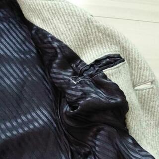 ライトグレーコートの画像