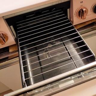 ピンクのガスコンロの画像