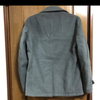 グレーのコートの画像