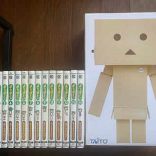 よつばと！のコミックと、ダンボーのフィギュア