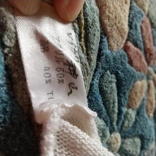 白のベストの画像