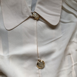 未使用タグ付きスーツの画像