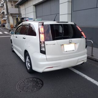 ストリーム1.8ＺＳ　Ｈ22後期　車検3/6　走行95000ｋ　純正ＨＤＤナビ＆地デジＴＶ＆カラーバックカメラ　ＥＴＣ　3列＆7人乗　純正エアロ＆15ＡＷ　キセノン　1オーナーの画像