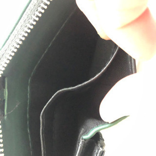 １月末まで今の半額でお渡しします❗️緑色の折りたたみ財布15✖️10㎝(閉じてる状態)の画像