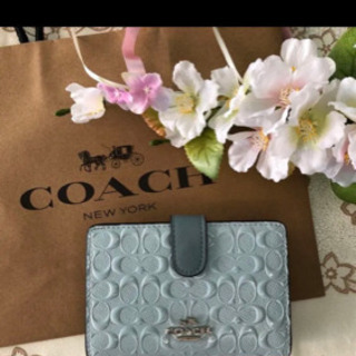 coach三つ折り財布。