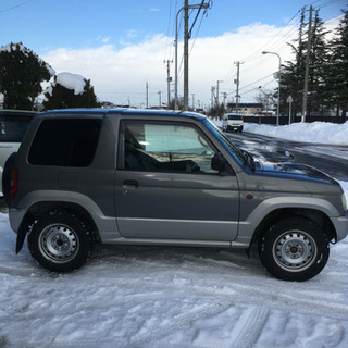 商談中 三菱 パジェロミニ 4wd 中古車 スタッドレスタイヤの画像