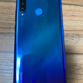 ファーウェイ　P30Lite 64GBピーコックブルー　SIMフリー　中古品　充電器　完全防水ケース付きの画像