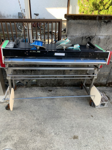 クロス貼り付け機