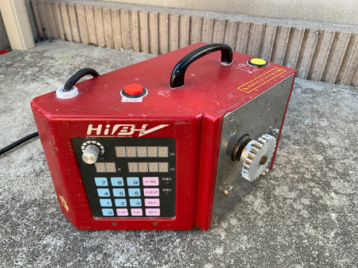 クロス貼り付け機