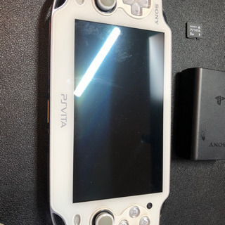 PSVITA 本体(白)と純正本革ポーチ、メモリーカード8GBの画像