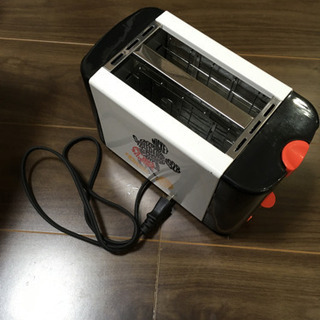 ミッキー型に焼き目がつく　飛び出すトースターの画像