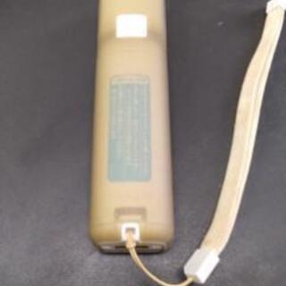 値下げしました。任天堂・Wiiリモコン ジャケット茶の画像