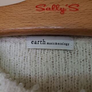 earthプードルセーターの画像
