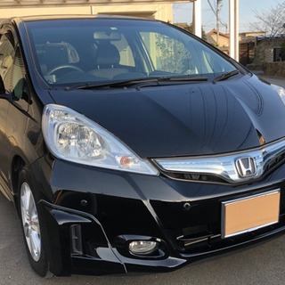 フィットハイブリッド！ナビ　テレビ！スマートキー！車検有ります。の画像