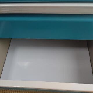 青いハンガー掛けの画像