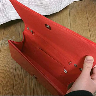 【取引者決定】赤い エナメル クラッチバッグの画像