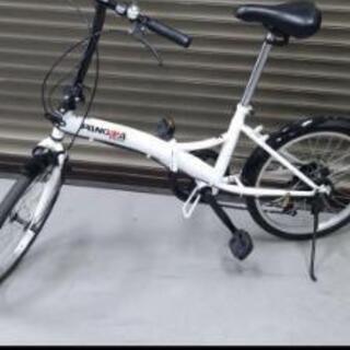 ノーパンクタイヤカゴ付き折りたたみ自転車