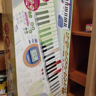 お取引中電子ピアノキーボードと楽譜