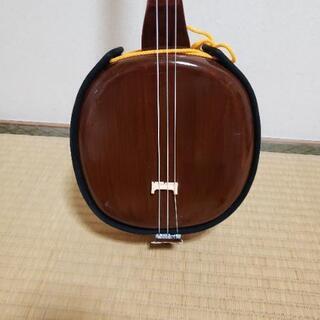 取引決定しました。三線の画像
