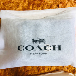 【未使用品】COACH 三つ折財布 ラッピング袋＆COACH紙袋付きの画像