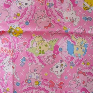 布・生地(はぎれ)ピンク色地　ジュエルペット・イルカドットハート柄[No.63]の画像