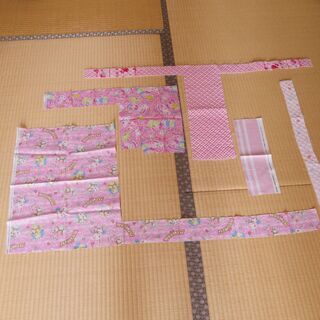 布・生地(はぎれ)ピンク色地　ジュエルペット・イルカドットハート...