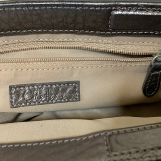 cole haan ポーチの画像