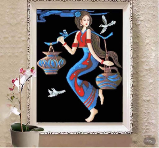 玉の玉十字刺繍です。