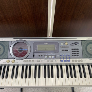 値下げしました　CASIO 光ナビゲーション 電子ピアノ スタンド付きの画像