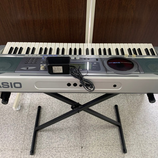 値下げしました　CASIO 光ナビゲーション 電子ピアノ スタンド付きの画像