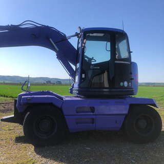 油圧ショベル　H9年　PW128 タイヤバックホーの画像