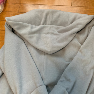 フードありの冬コートの画像