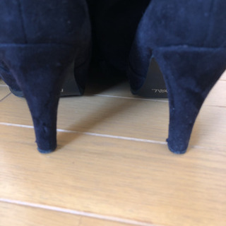 黒のニーハイブーツの画像