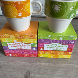 ペコの重なるカラフルマグの画像