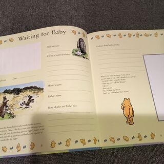 クマのプーさんの絵本のような新生児の成長記録張の画像