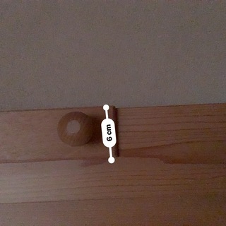 鴨居にかけるハンガーの画像