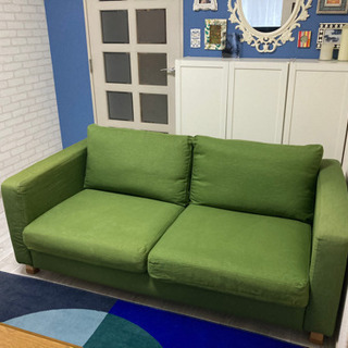 グリーンの3人掛けソファー【白いカバー付き】の画像