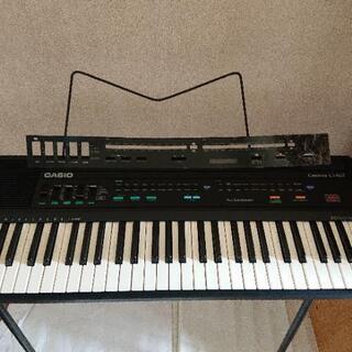 CASIO 電子ピアノ 使用済みピアノの練習本 の画像
