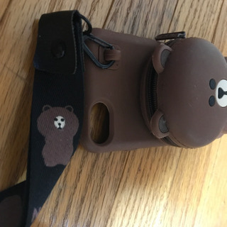 ブラウンの首掛けスマホケースの画像