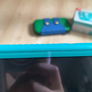 ニンテンドースイッチライト ターコイズブルー＆モンハンライズの画像