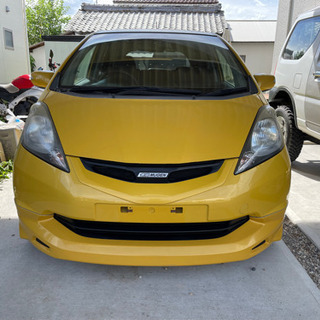 ホンダ　フィット　イエローの画像