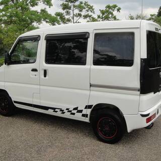 値下げしました！なんと平成25年車 車検満タン2年の車が30万円 タイミングベルト交換済み！ 錆なし本土から NV100 クリッパーバン DX 社外アルミホイール 社外ナビゲーション 地デジTVの画像
