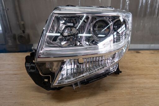 LA600Sタント ヘッドライトユニット左側中古品 タント DBA-LA600S 左