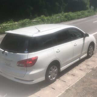 5ナンバーステーションワゴン　4WD　ウイングロード　車検付けてコミコミ　の画像