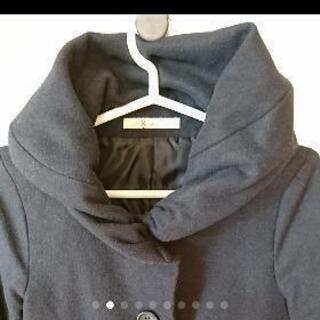 紺色コートの画像