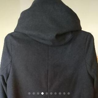 紺色コートの画像