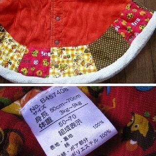 ビッツ）オレンジ系総柄（５０～７０）厚手ケープの画像
