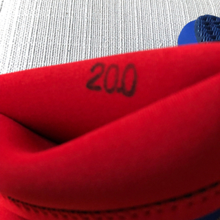 子供用ウエットスーツ　と　マリンシューズの画像