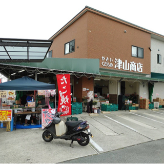 野菜の販売、袋詰めの画像